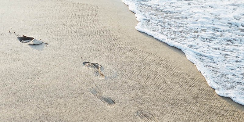 Marcaser - huellas sobre la arena